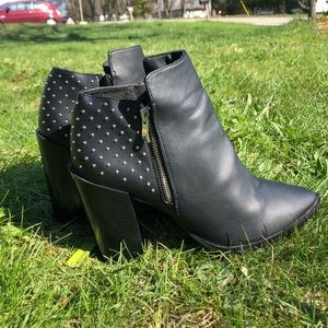 Tall block heel ankle booties.
